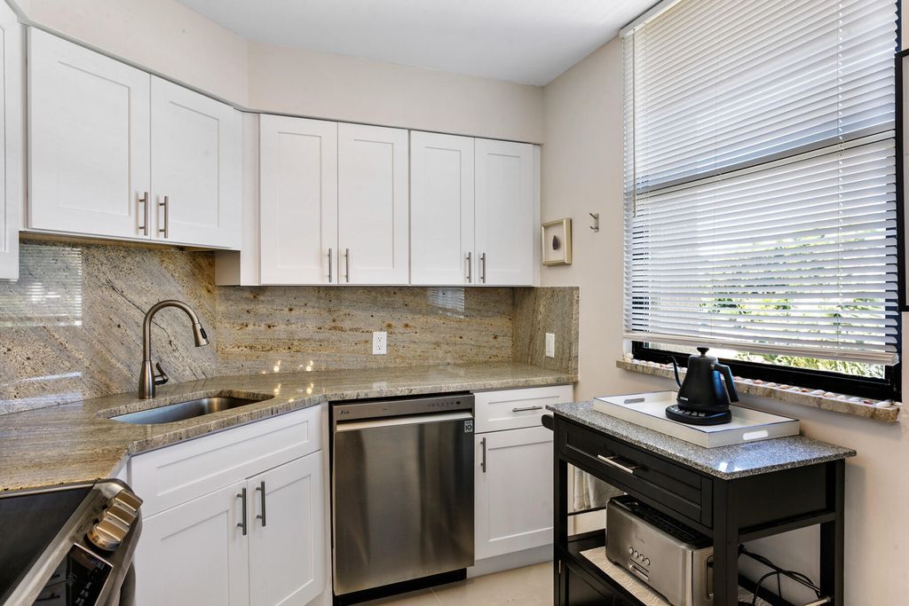 Photo of 130 Lakeshore Drive #323, North Palm Beach, FL 33408 (MLS # R11013041)