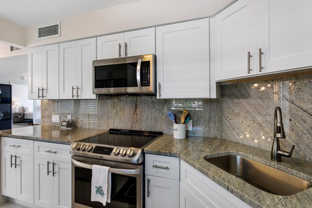 Photo of 130 Lakeshore Drive #323, North Palm Beach, FL 33408 (MLS # R11013041)