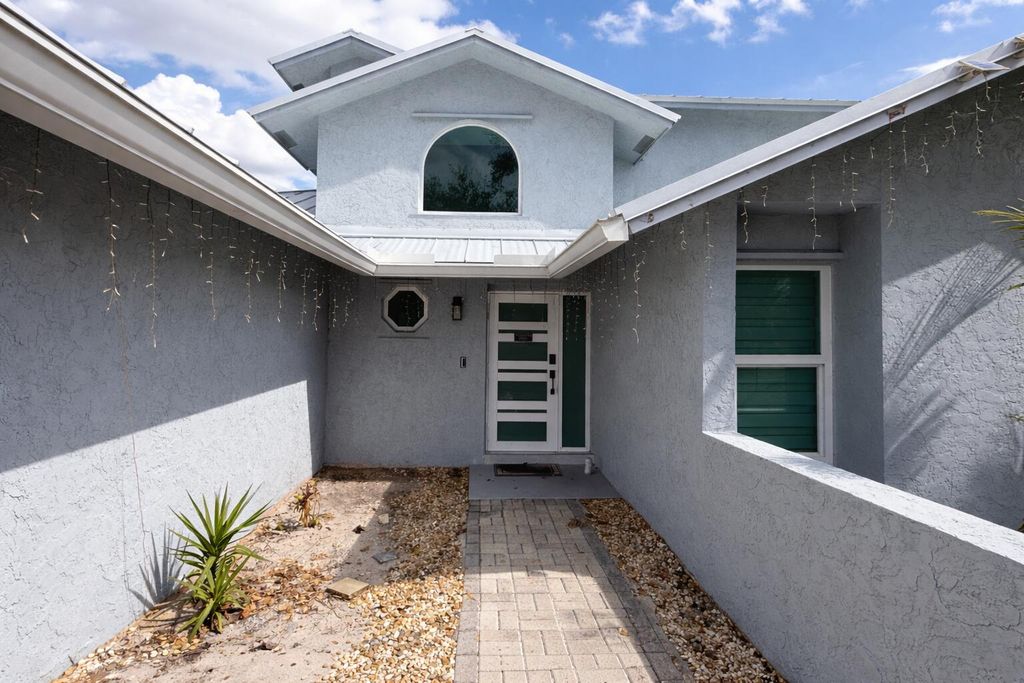 Photo of 149 Ponce De Leon Street, Royal Palm Beach, FL 33411 (MLS # R11167855)