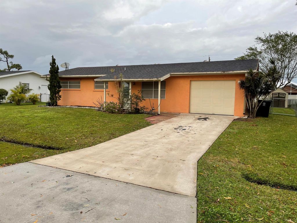 Photo of 1397 SE Odonnell Lane, Port Saint Lucie, FL 34983 (MLS # R10964845)