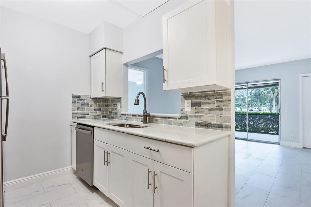 Photo of 6313 Chasewood Drive #B, Jupiter, FL 33458 (MLS # R10766176)