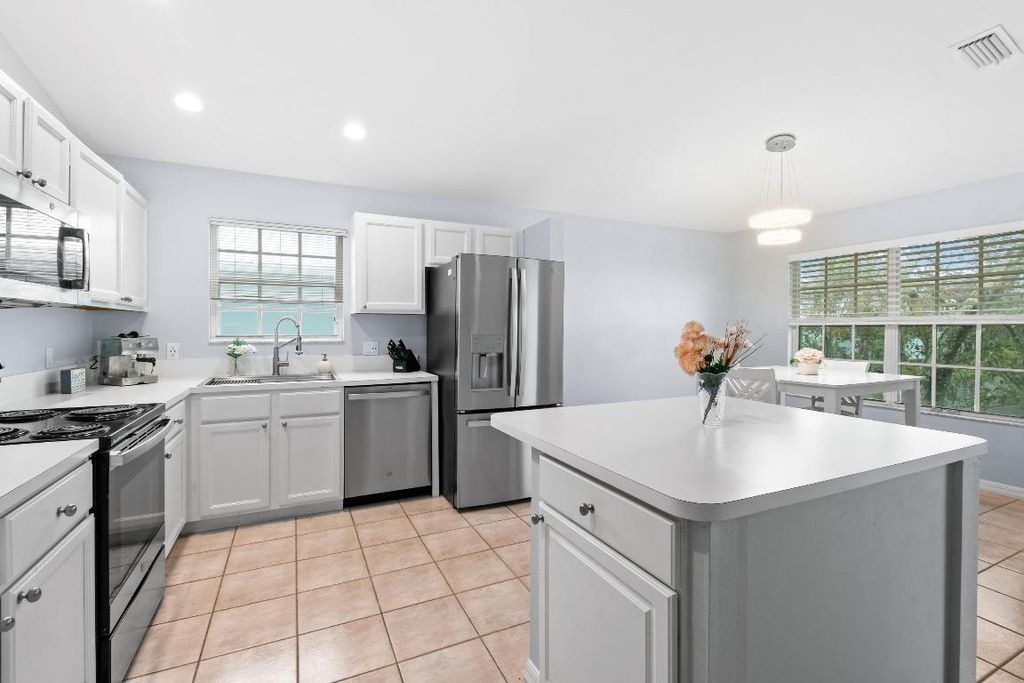 Photo of 1106 SW Swan Lake Circle #1603, Port Saint Lucie, FL 34986 (MLS # R10951154)