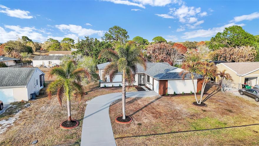 Fully Renovated Pool Home!!!Like New Construction!Completely redesigned and upgraded from top to bottom, this beautifully renovated home offers modern living with high-quality finishes throughout. Updates include a brand-New Kitchen, New bathrooms, New Flooring, fresh paint, New Roof, New A/C, and New Appliances, delivering a true move-in-ready experience.Enjoy spacious living areas and a private pool ideal for entertaining or relaxing year-round. Located in a desirable Port St. Lucie neighborhood near shopping, dining, schools, and easy highway access.A turnkey opportunity! everything has already been done for you! Turnkey fully remodeled pool home! Top-to-bottom renovation including new kitchen, bath, flooring, NEW ROOF, NEW A/C, and appliances. Move right in and enjoy!