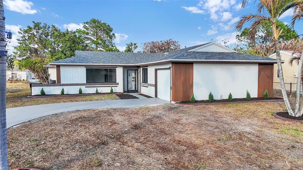 Photo of 257 SW Cherryhill Road, Port Saint Lucie, FL 34953 (MLS # F10554610)