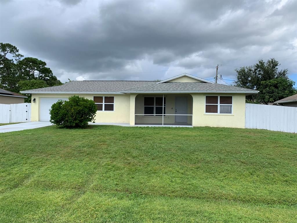 Photo of 1031 SW Payne Avenue, Port Saint Lucie, FL 34953 (MLS # R10752018)