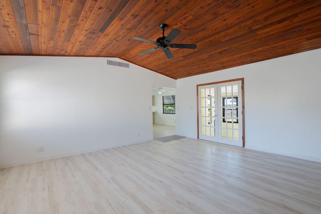 Photo of 6403 SE Lockerby Place, Hobe Sound, FL 33455 (MLS # R11066890)