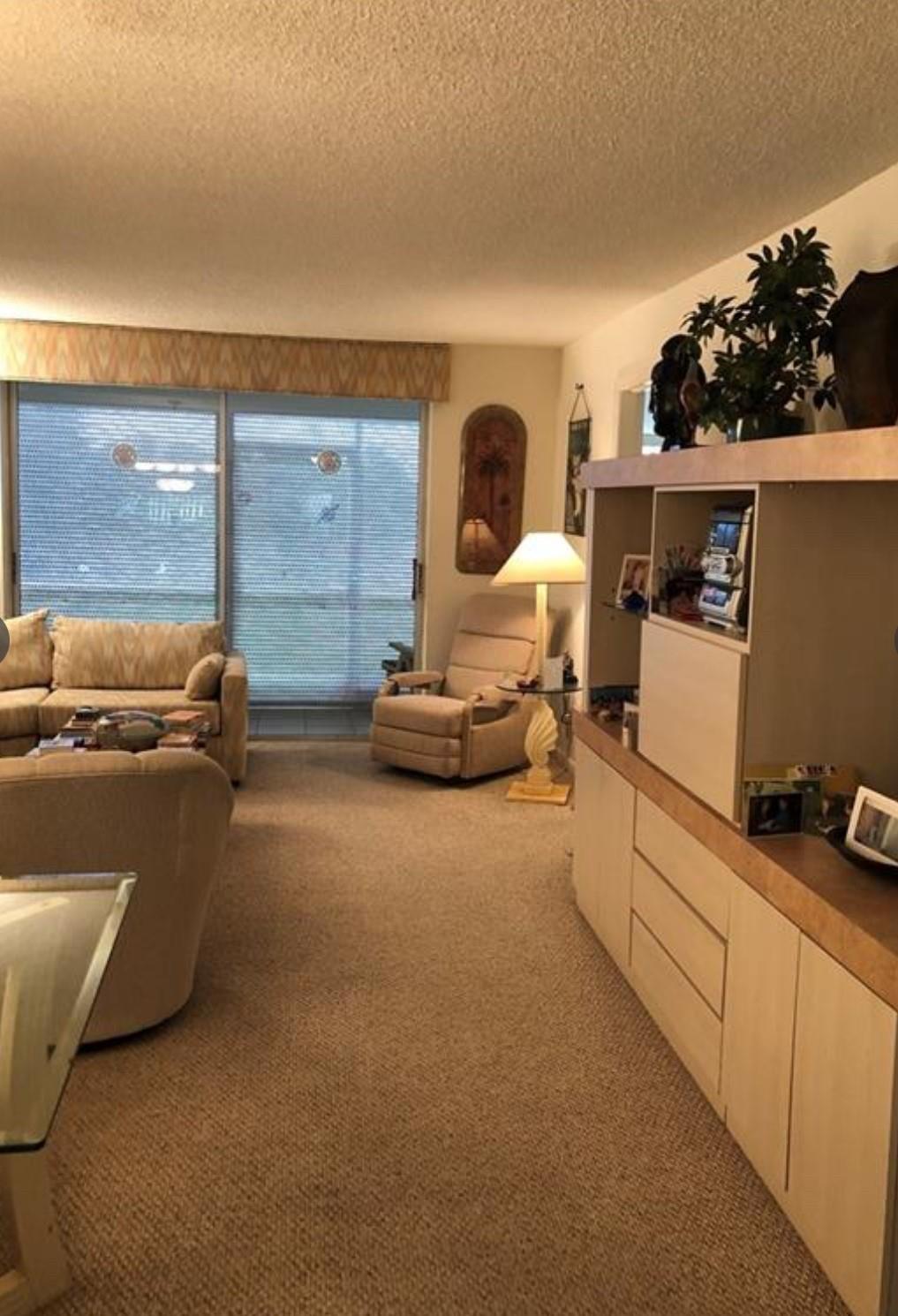 HERE IS THE CHANCE TO OWN A 1ST FL CORNER END 2/2 UNIT WITH A LAKE VIEW IN SUNRISE. BEAUTIFUL NATURAL LIGHT. ENJOY MORNING COFFEE/TEA OR A GLASS OF WINE ON THE PEACEFUL AND QUIET ENCLOSED PATIO. FULLY PROTECTED AND ONE OF THE ONLY UNITS ACCORDION SHUTTERS THROUGHOUT FOR PEACE OF MIND WHEN AWAY, OR JUST EASY PREPAREDNESS FOR A STORM. THIS IS A VERY WELL-KEPT CONDOMINIUM WITH SO MUCH TO OFFER INCLUDING: NOT ONE, BUT (5 POOLS) TO ENJOY WITH FRIENDS AS THERE IS AN ABUNDANCE OF GUEST PARKING. TERRIFIC AMENITIES INCLUDING TENNIS, SHUFFLEBOARD, CLUBHOUSE WITH GOLF, THEATER EVENINGS, BILLIARDS, EXERCISE ROOM, BINGO AND PLENTY OF ACTION. ENJOY SOUTH FL LIVING! NO LEASING