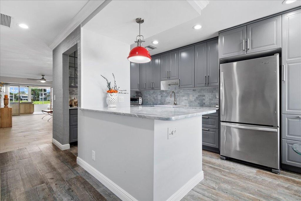 Photo of 1395 SW 27th Avenue #102, Delray Beach, FL 33445 (MLS # B26047306)