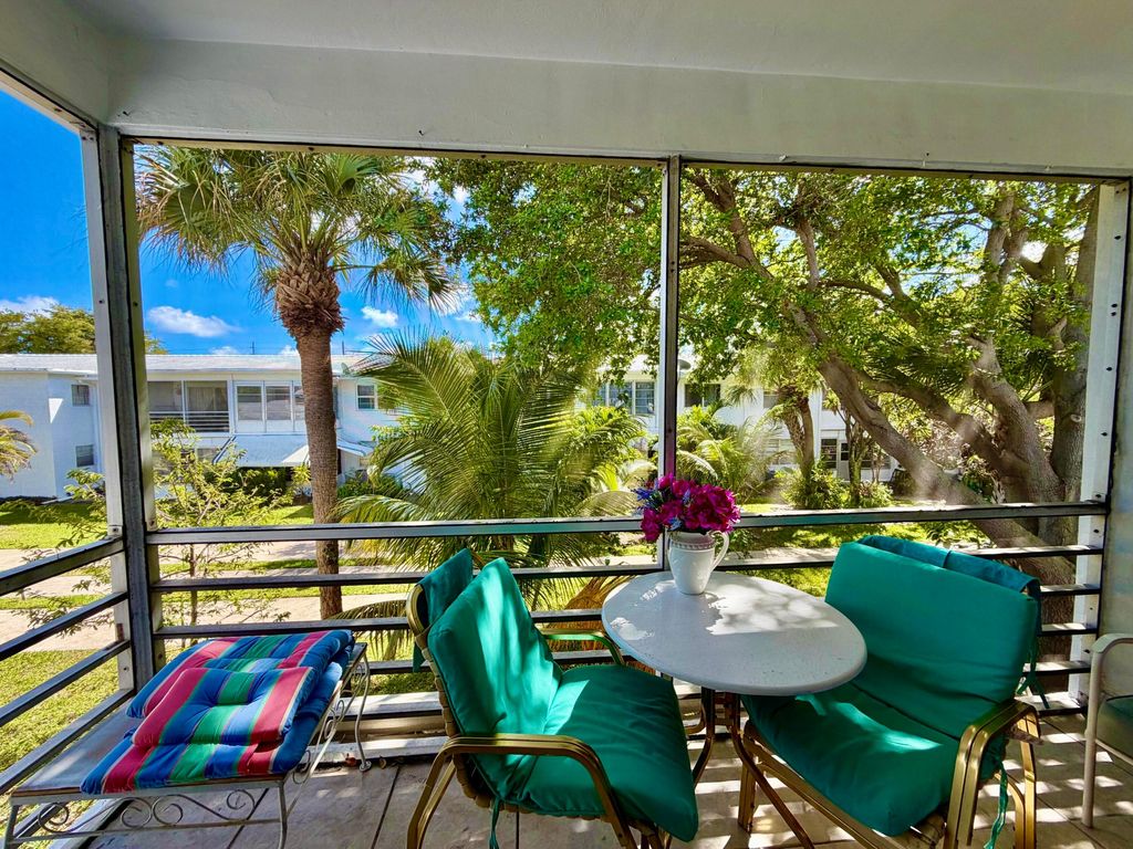 Photo of 2551 W Golf Boulevard #204, Pompano Beach, FL 33064 (MLS # B26001483)