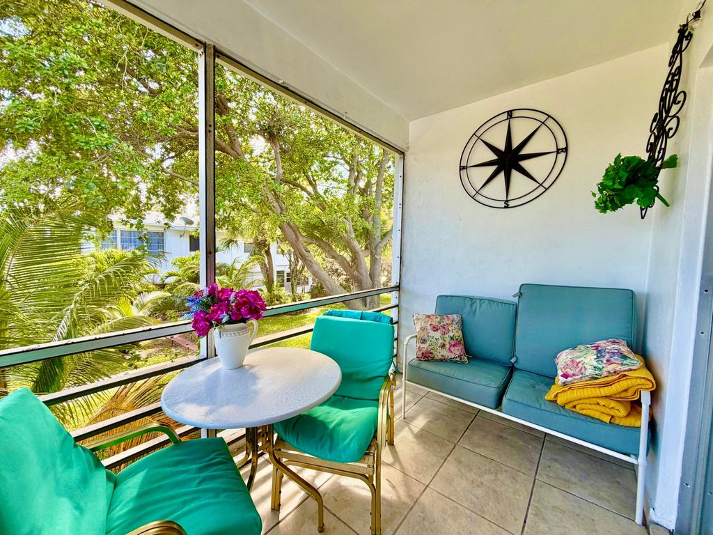 Photo of 2551 W Golf Boulevard #204, Pompano Beach, FL 33064 (MLS # B26001483)