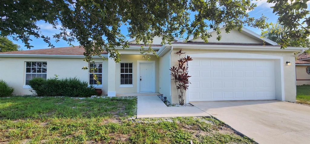 Photo of 1137 SW Gardena Avenue, Port Saint Lucie, FL 34953 (MLS # R11007760)