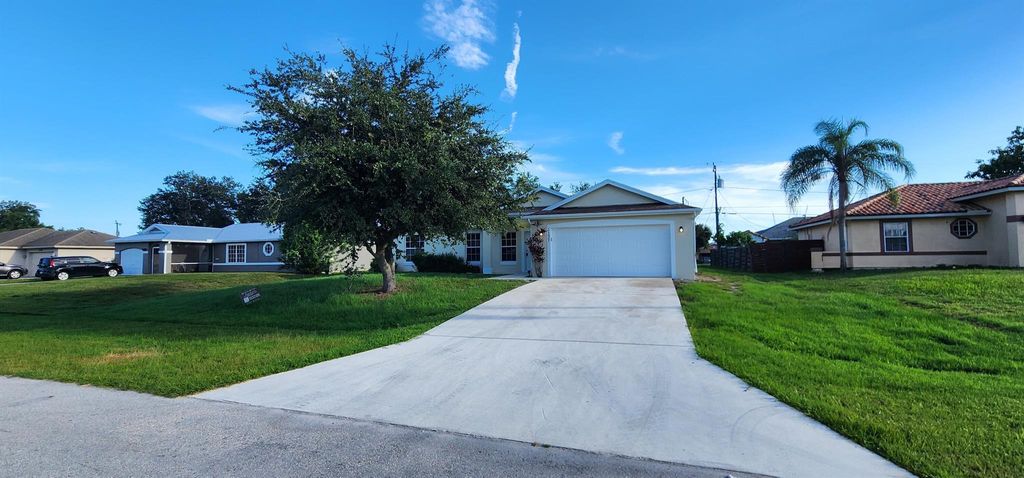 Photo of 1137 SW Gardena Avenue, Port Saint Lucie, FL 34953 (MLS # R11007760)