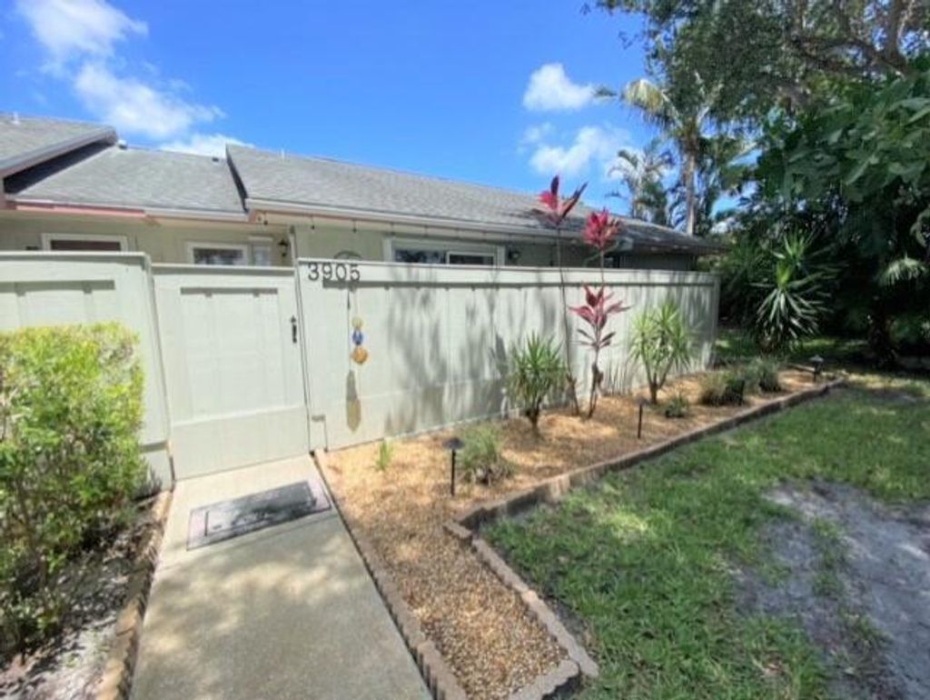 Photo of 3905 NW Cinnamon Tree Circle, Jensen Beach, FL 34957 (MLS # R10833778)
