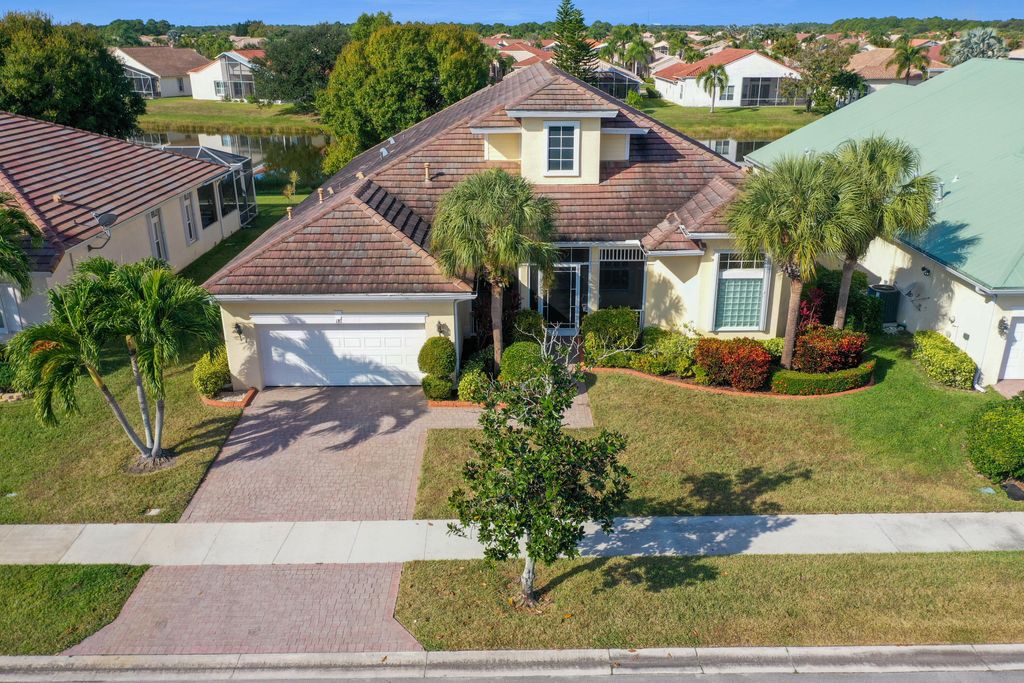 Photo of 181 NW Magnolia Lakes Boulevard, Port Saint Lucie, FL 34986 (MLS # R11143029)