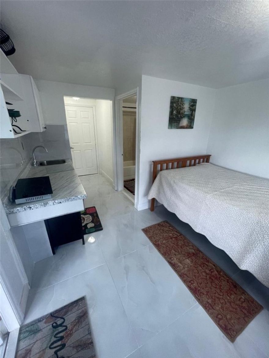 NEWLY RENOVATED FULLY FURNISHED 1-bedroom 1-bathroom unit in central location and within close proximity of Broward College South Campus....rent includes electricity and water and adequate parking space in a quiet neighborhood just off Pines Blvd....please use Rent Spree application for background and contact Listing Agent for more details & showings....READY FOR IMMEDIATE OCCUPANCY !!!! Owner also has EFFICIENCY fully furnished for rent at $1100 per month includes utilities