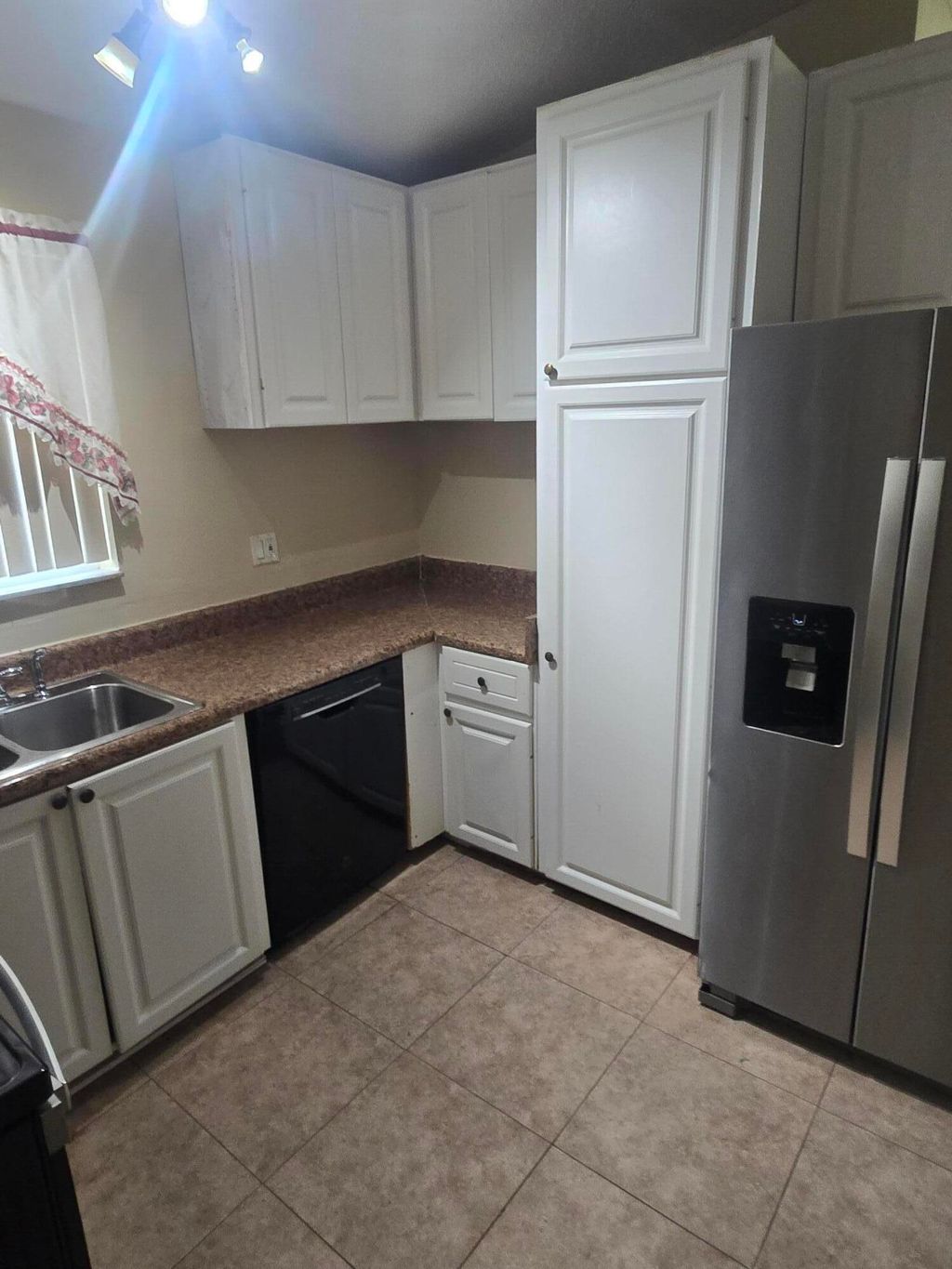Photo of 4941 N Marbella Rd RD N, West Palm Beach, FL 33417 (MLS # B26031035)