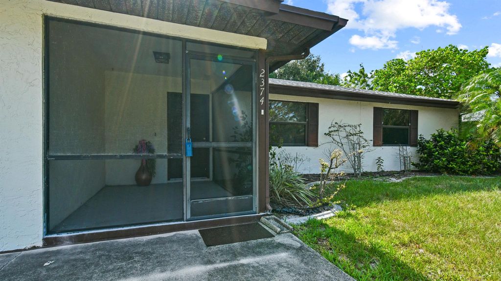 Photo of 2374 SE Marseille Street, Port Saint Lucie, FL 34952 (MLS # R11097250)