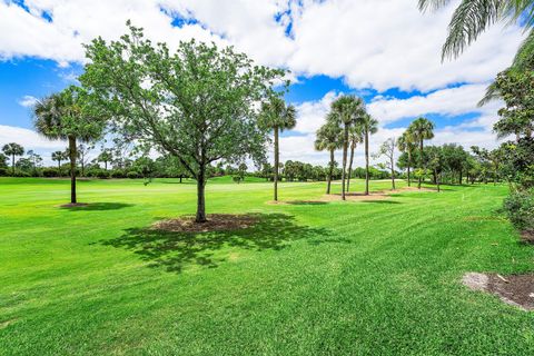 Photo of 136 Coral Cay Drive, Palm Beach Gardens, FL 33418 (MLS # B26017539)