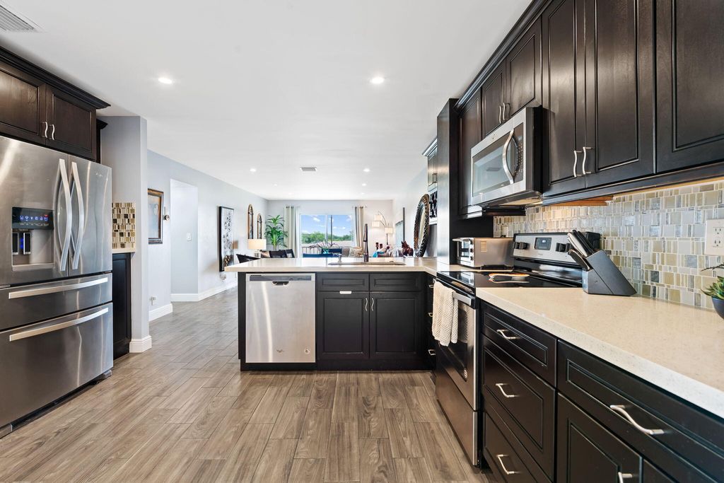 Photo of 3535 Brokenwoods Drive #404, Coral Springs, FL 33065 (MLS # B26040622)