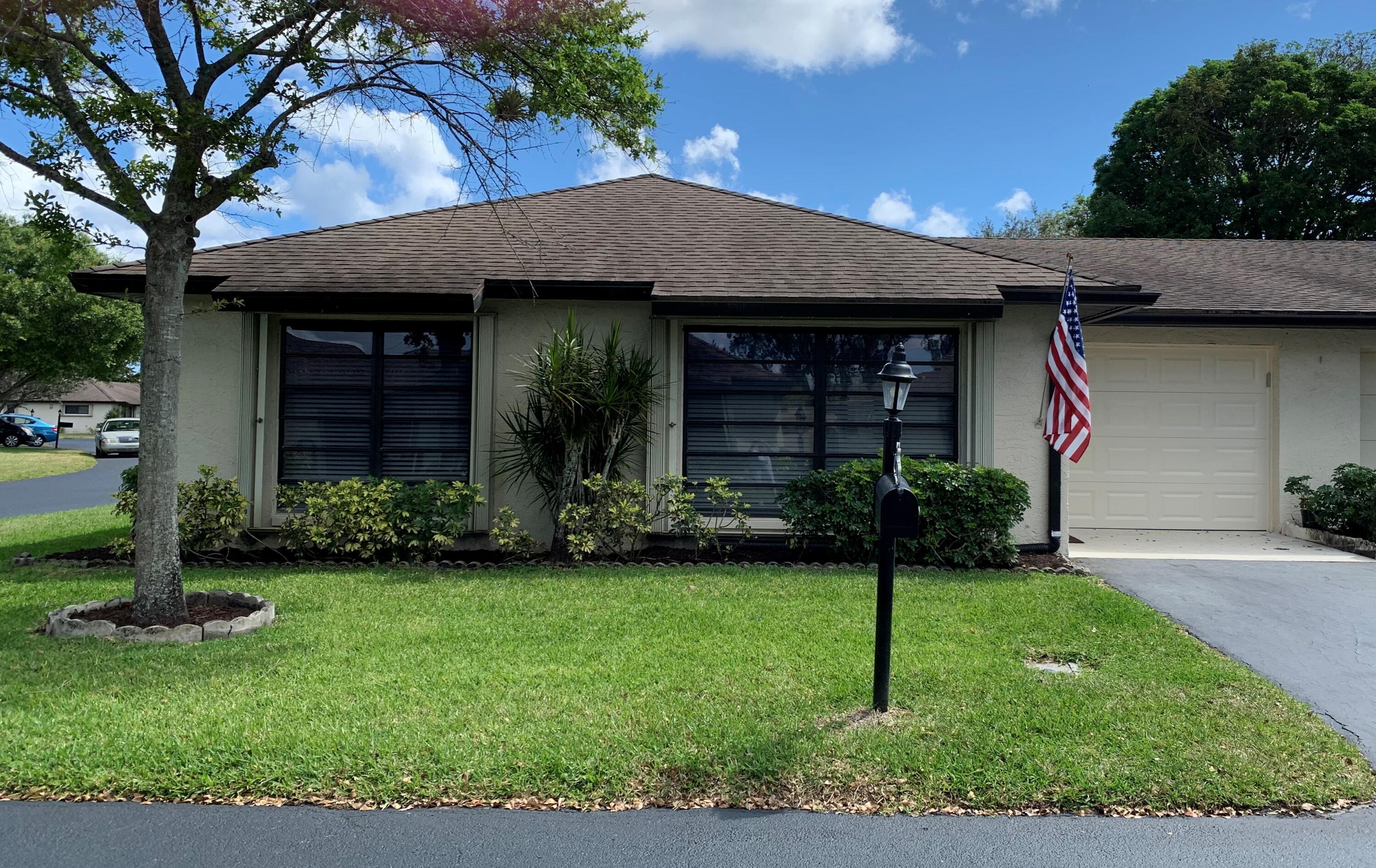 Beautifully renovated unit in Greentree Villas. New laminate wood flooring. All new wood cabinetry, stainless steel appliances and glass back splash in kitchen; new tile work and vanities in both baths. Florida room directly off of kitchen and dining room is a great place to entertain or just relax. Close to the Storkwood satellite pool. Newer water heater; New washer and dryer, interior paint and garage door. All measurements approximate. Owner-agent.
