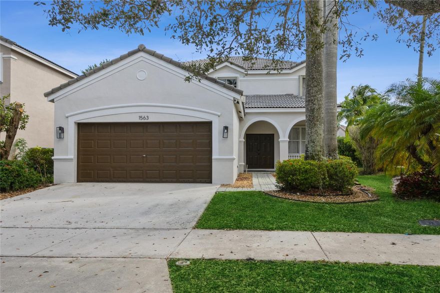Discover your dream Home in Weston’s most sought-after resort style community, Savannah! Celebrated for its  welcoming vibe. This charming Home combines style with comfort, featuring an open, light-filled living area with upgraded Turkish Porcelain tile throughout living area. The heart of the home, a kitchen with ample storage, opening to the family room and views of the backyard, your private oasis. Here an extended patio and Jacuzzi spa promise relaxation and entertainment options. This area values lifestyle with top public schools, parks, close to major highways, shops and restaurants. This Home offers a luxurious, yet comfortable living experience. Seize the chance to make this beautiful Home yours and embrace a blend of luxury and convenience in Weston’s Savannah.