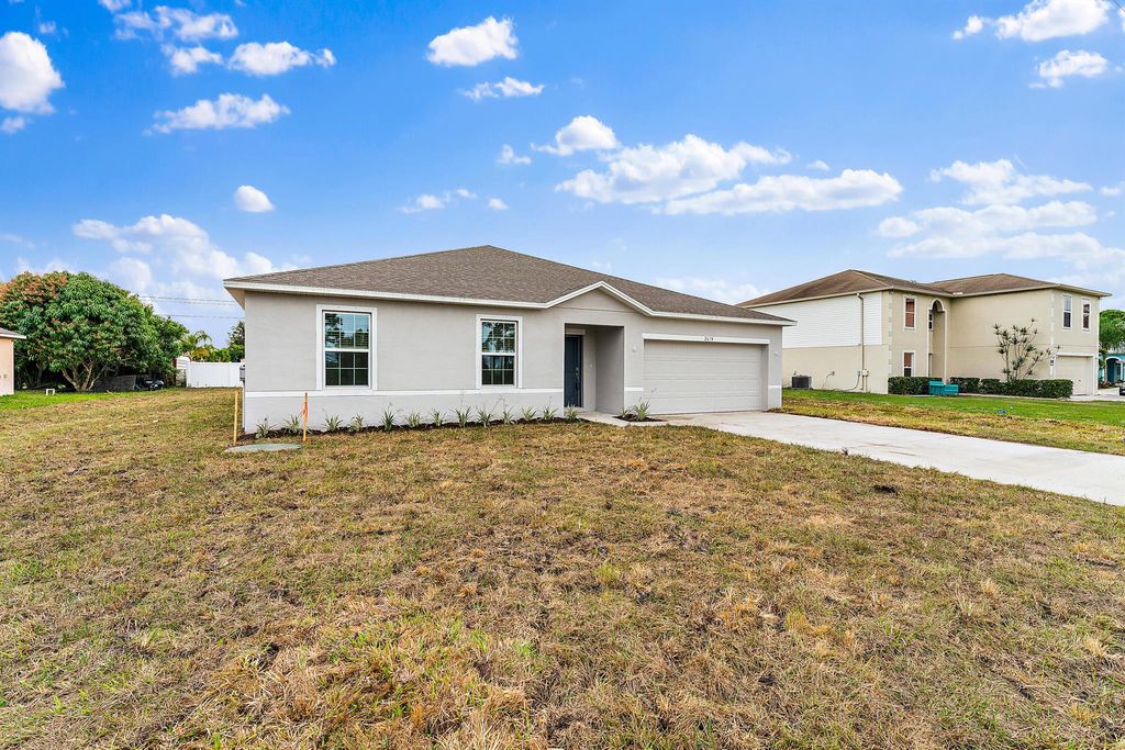 Photo of 2674 SE Walton Road, Port Saint Lucie, FL 34952 (MLS # R10966412)