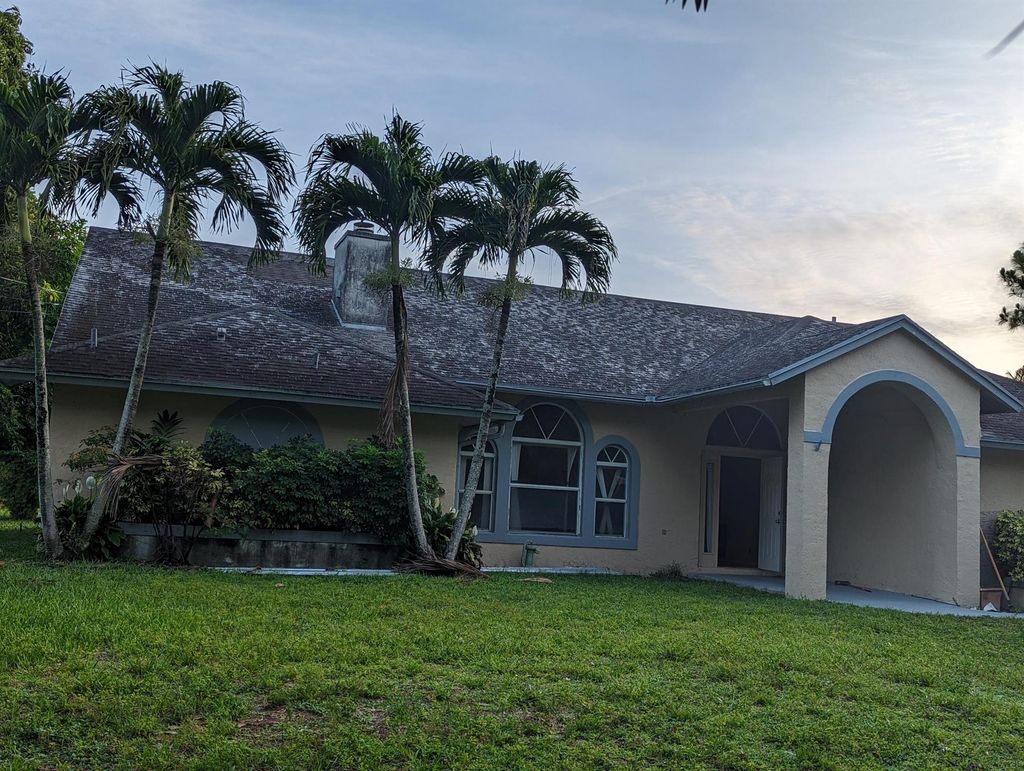 Photo of 15057 77th Place N, Loxahatchee, FL 33470 (MLS # R10893272)