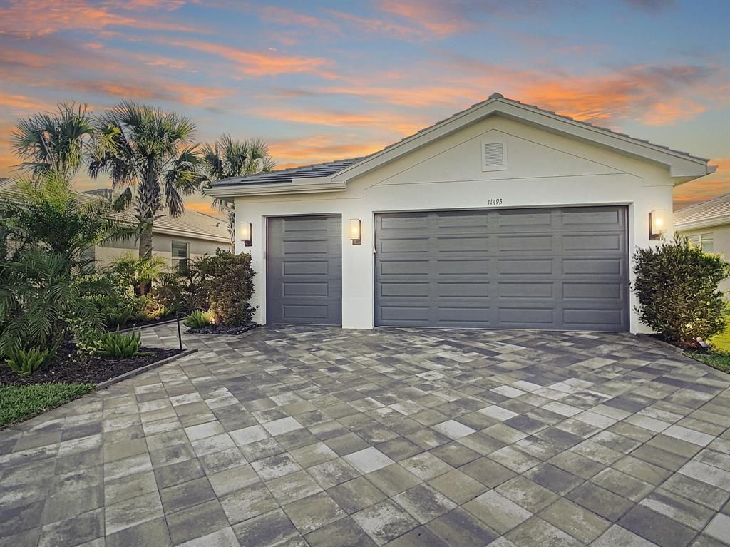 Photo of 11493 SW Half Moon Lake Lane, Port Saint Lucie, FL 34987 (MLS # R10798319)