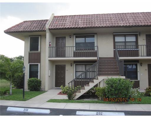 Owner will update the unit for you! Will be great with new floors and freshly painted. It is rented until May 30th. After tenant's move out contractors should have it ready in one week. HOA requires 30 days for approval. The unit will be ready for you as soon as HOA approves.2 Bed/ 2 Baths, 2nd floor,CORNER unit. INCLUDES BASIC CABLE & WATER! Kitchen with Eat in area, pantry and pass thru window. Spacious Master Bedroom with walk-in closet and 2nd closet. Full size washer & dryer. Screened patio has small storage area. Accordion hurricane shutters. Close to shopping center, and restaurants. Condo association requires approval. Pet friendly allowed up to 50 lbs.,no aggressive breeds. Close to Wellington Mall with easy access to I-95 and Turnpike. Peaceful development with clubhouse, p