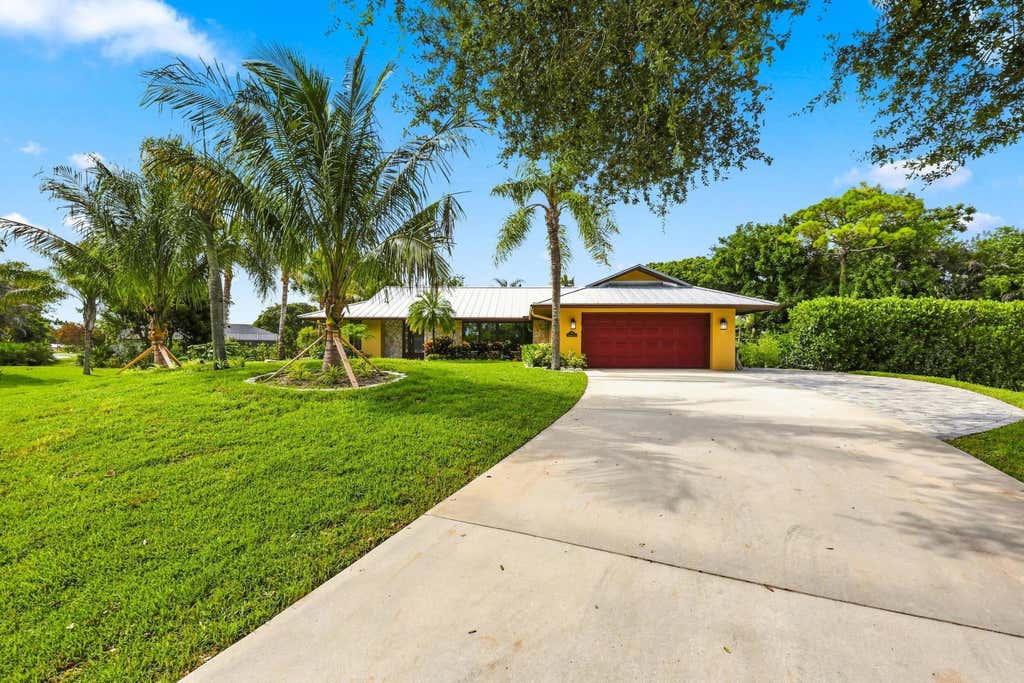 Photo of 3120 NE HEATHER Court, Jensen Beach, FL 34957 (MLS # B26058201)