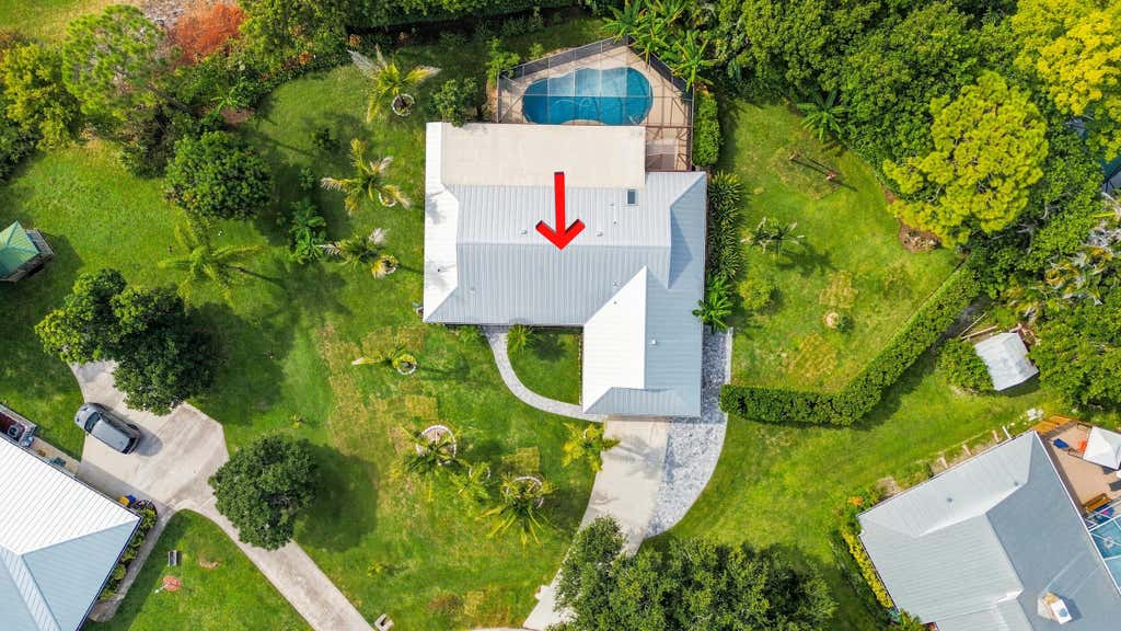 Photo of 3120 NE HEATHER Court, Jensen Beach, FL 34957 (MLS # B26058201)