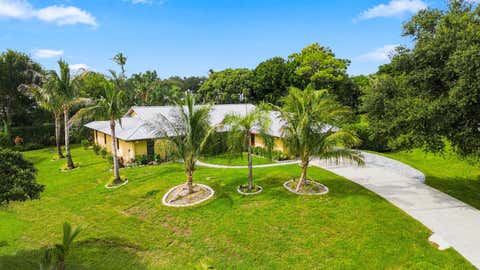 Photo of 3120 NE HEATHER Court, Jensen Beach, FL 34957 (MLS # B26058201)