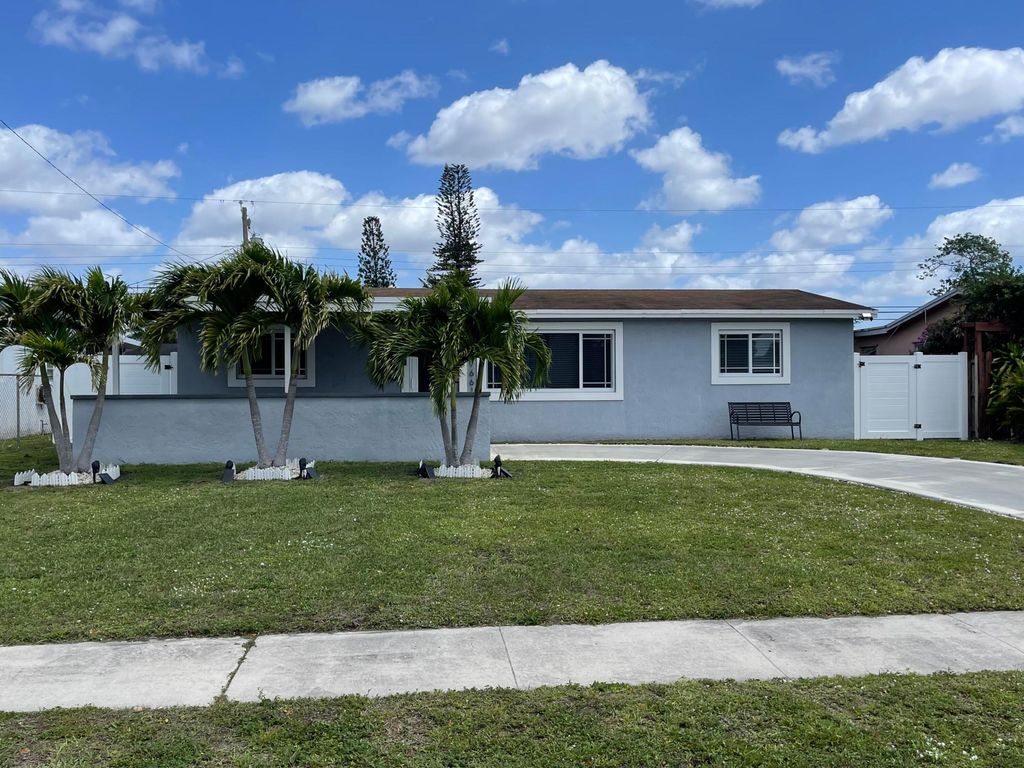 Photo of 7661 Farragut Street, Hollywood, FL 33024 (MLS # B26020232)