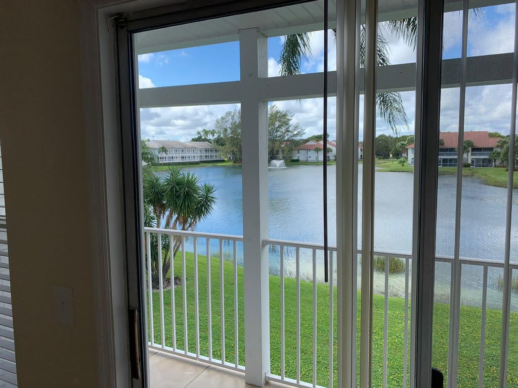 Photo of 293 Cypress Point Drive #293, Palm Beach Gardens, FL 33418 (MLS # B26023393)