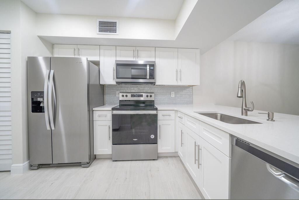 Photo of 208 Brackenwood Terrace #208, Palm Beach Gardens, FL 33418 (MLS # R10747743)