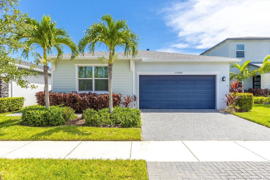 Don't miss this incredible opportunity to own a newer Lilac model home in the highly desirable gated community of Manderlie at TRADITION! With its modern Coastal design and inviting curb appeal, this home is built for both comfort and style. Enjoy peace of mind with impact-resistant windows and doors and cook like a pro in the gourmet kitchen featuring stainless steel appliances, a natural gas range, ''White Sand'' granite countertops, 42'' upper cabinets, and upgraded plank tile flooring. The open layout boasts soaring 9'4'' ceilings and a tray ceiling in the Great Room, creating a bright and airy living space. Relax on the spacious front porch or unwind on the covered lanai. With countless upgrades throughout, this home truly stands out--come see it for yourself today!