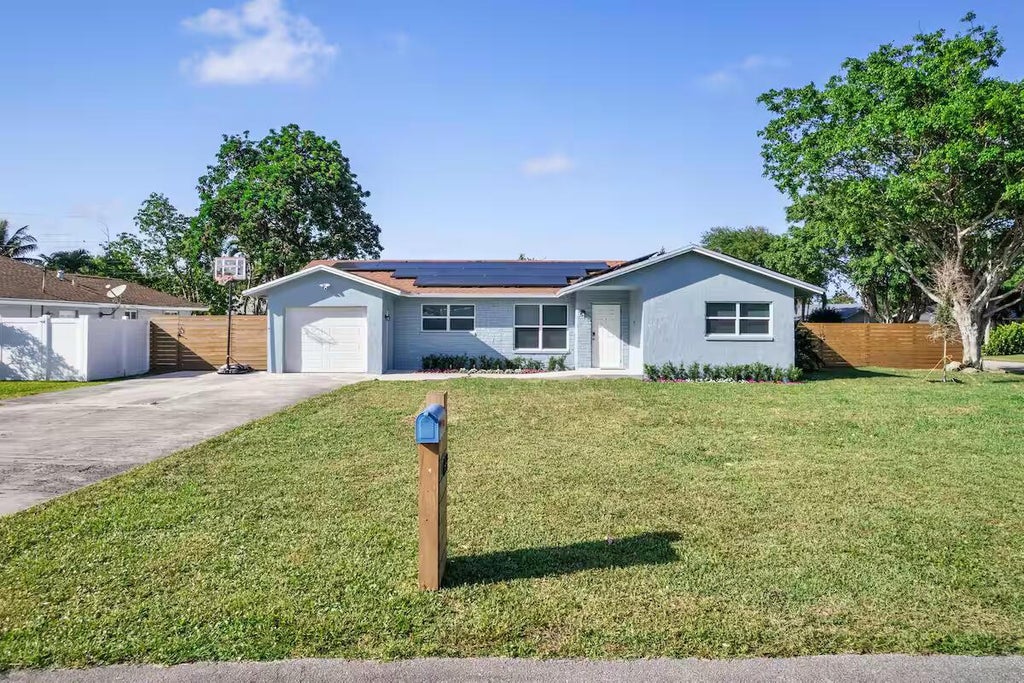 Photo of 667 Blue Jay Road, Delray Beach, FL 33444 (MLS # R11129393)