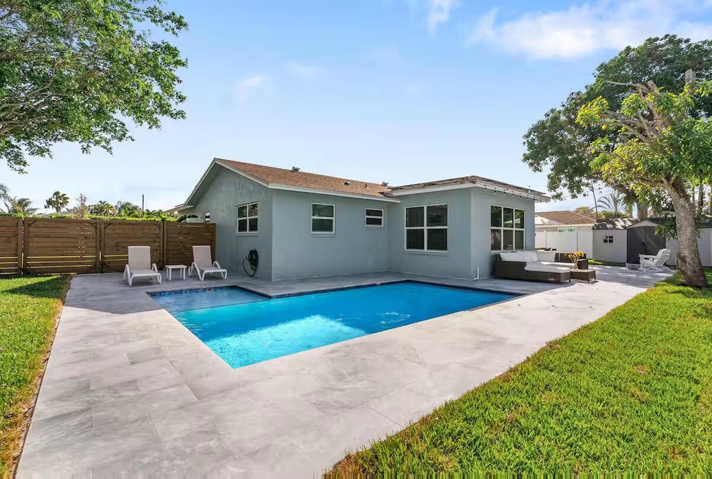 Photo of 667 Blue Jay Road, Delray Beach, FL 33444 (MLS # R11129393)