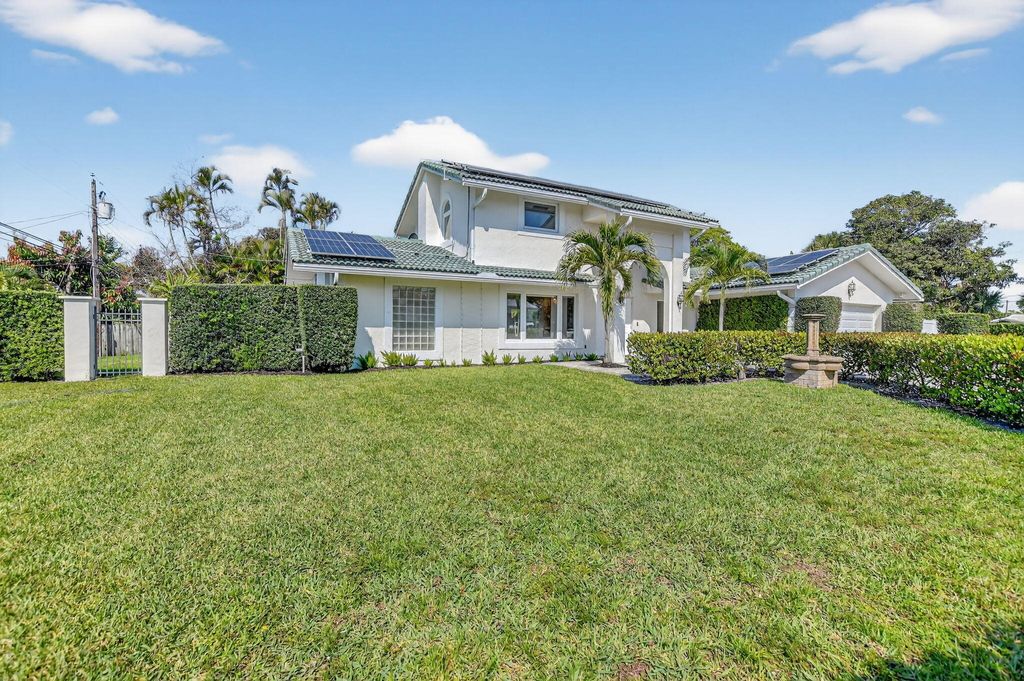 Photo of 1455 Isabel Este Road E, Boca Raton, FL 33486 (MLS # B26007165)