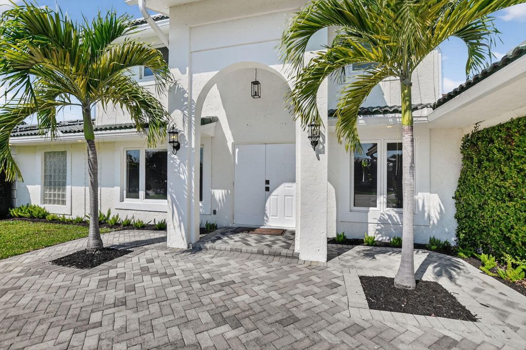 Photo of 1455 Isabel Este Road E, Boca Raton, FL 33486 (MLS # B26007165)