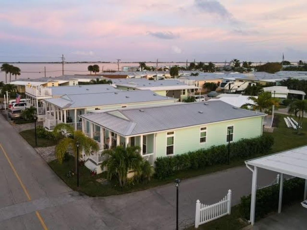 Photo of 84 NE Ocean Breeze Drive, Jensen Beach, FL 34957 (MLS # R10858242)