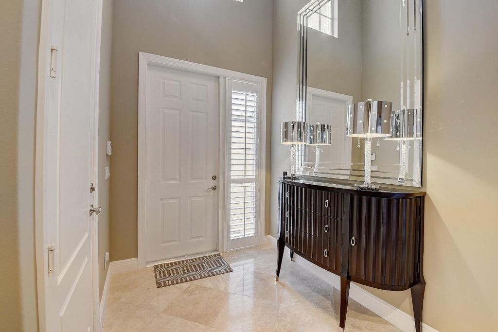 Photo of 5645 NE Trieste Way, Boca Raton, FL 33487 (MLS # R11138415)