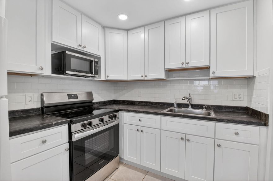 Recently updated 1-bedroom, 1.5-bath first-floor condo in Kings Point, Delray Beach. Features custom cabinetry and tile flooring throughout. 2024 upgrades include a new A/C system, stove, washer/dryer combo, and hurricane-impact windows and door. Located in a vibrant 55+ active adult community with outstanding amenities including multiple clubhouses, indoor and outdoor pools, fitness centers, golf, tennis, pickleball, shuffleboard, theater, on-site dining, clubs, social activities, and community transportation. Conveniently located near shopping, dining, and the beautiful beaches of Delray Beach.