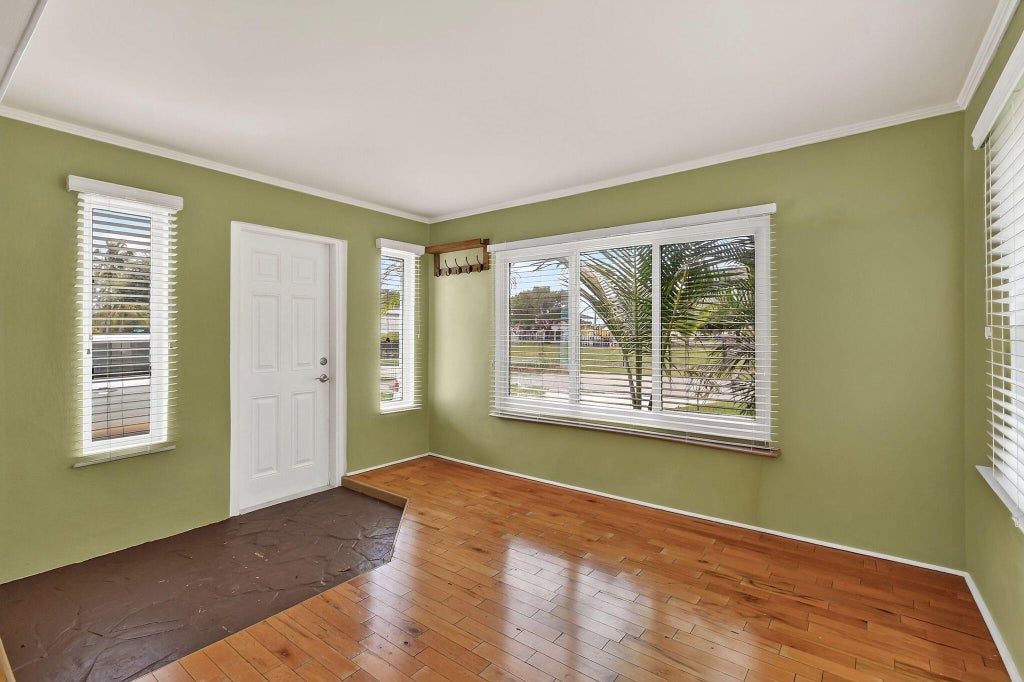 Photo of 411 Evergreen Drive, Lake Park, FL 33403 (MLS # B26071800)