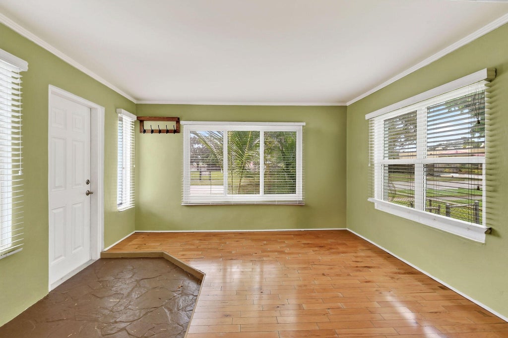 Photo of 411 Evergreen Drive, Lake Park, FL 33403 (MLS # B26071800)