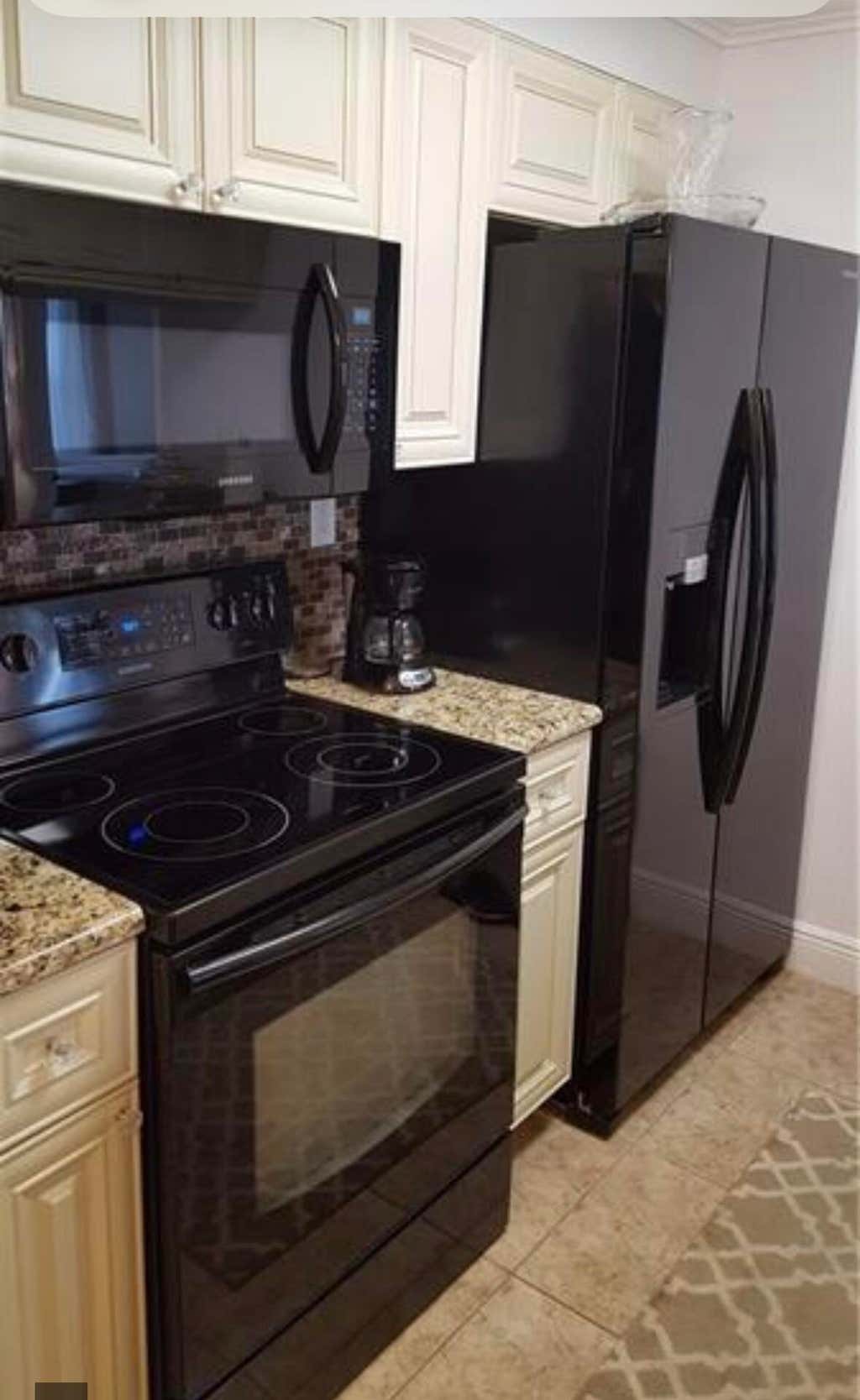 Photo of 9466 BOCA COVE Circle #301, Boca Raton, FL 33428 (MLS # B26063918)