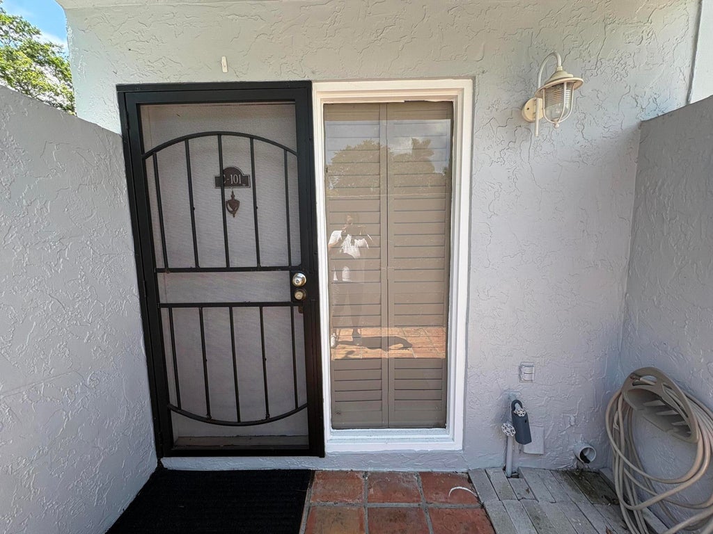 Photo of 25 DEER CREEK Road #C101, Deerfield Beach, FL 33442 (MLS # B26074081)