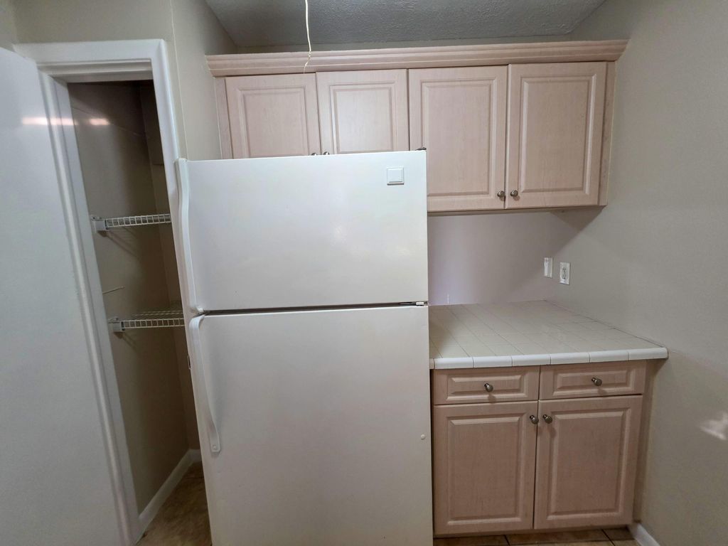 Photo of 6080 Forest Hill Boulevard #103, West Palm Beach, FL 33415 (MLS # B26003310)