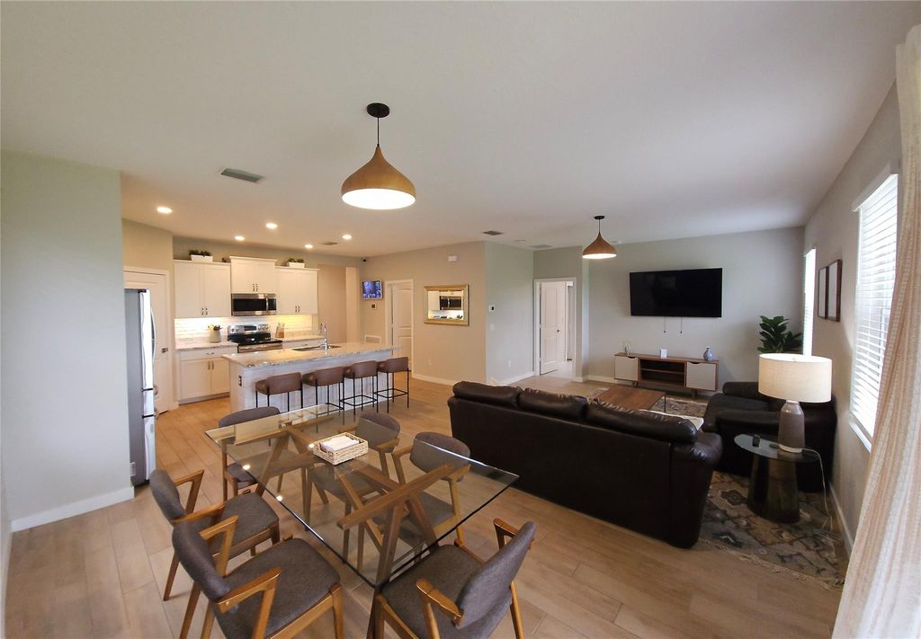 Photo of 3034 NE Skyview Lane, Jensen Beach, FL 34957 (MLS # F10489194)