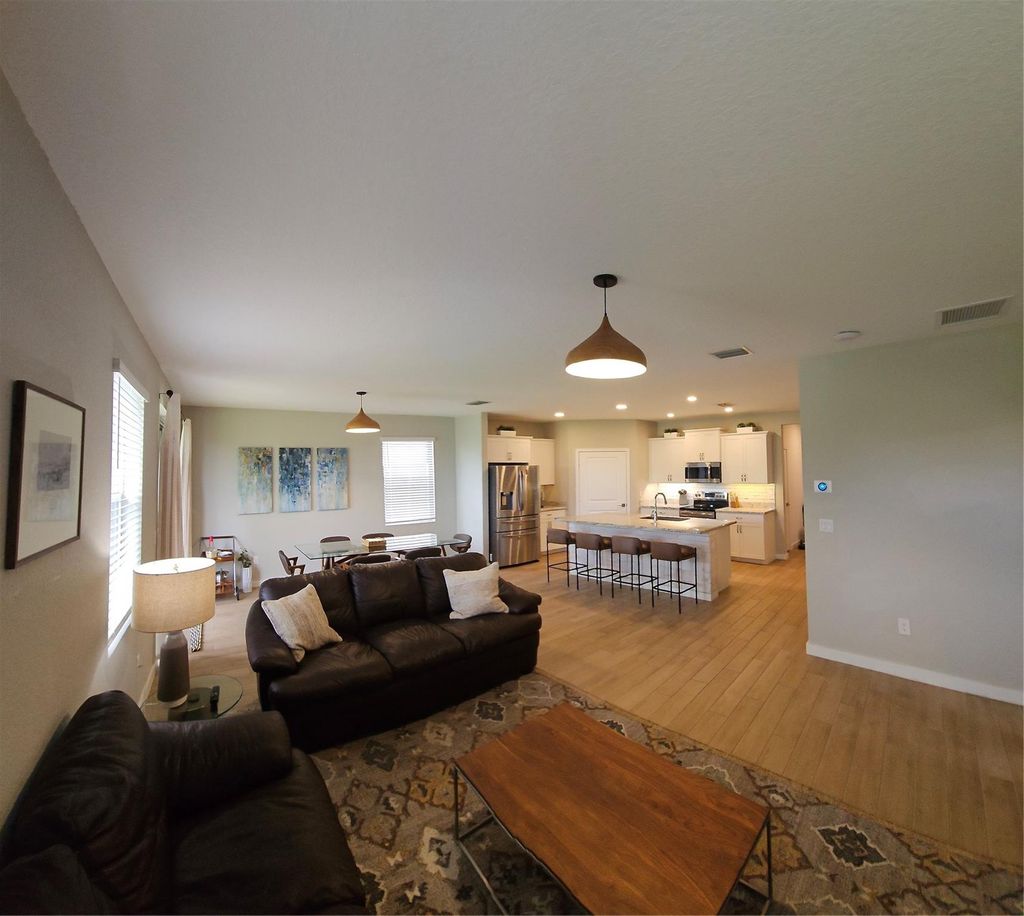 Photo of 3034 NE Skyview Lane, Jensen Beach, FL 34957 (MLS # F10489194)